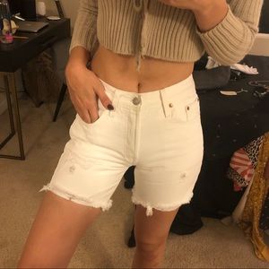 Levi’s 501 distressed midi shorts